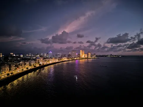 Marine Drive curving around the bay at dusk