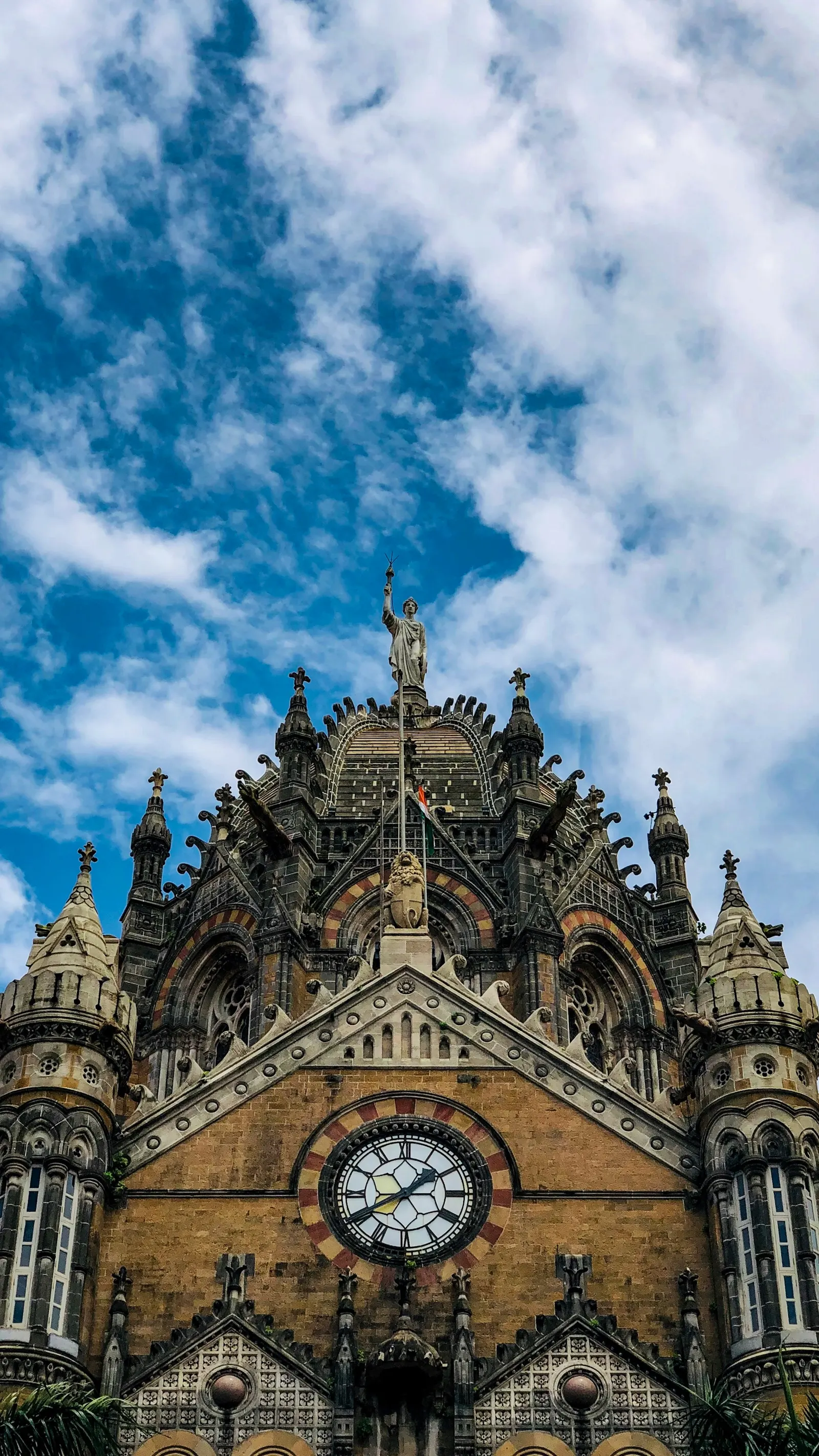 CSMT’s clock, carved façade and dome crowned by a statue