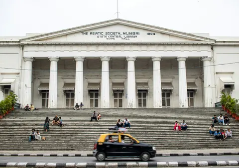 The white-columned façade and steps of the Asiatic Town Hall